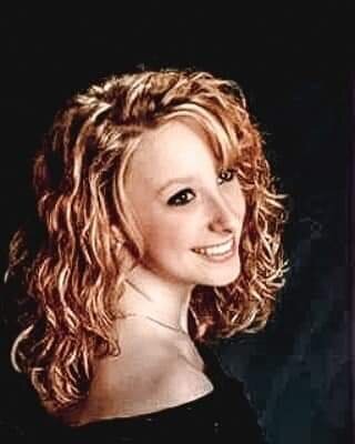 Sarah Jackson in a senior year high school photo. She was 17 years old when Cameron Giovanelli, then 29, began abusing h