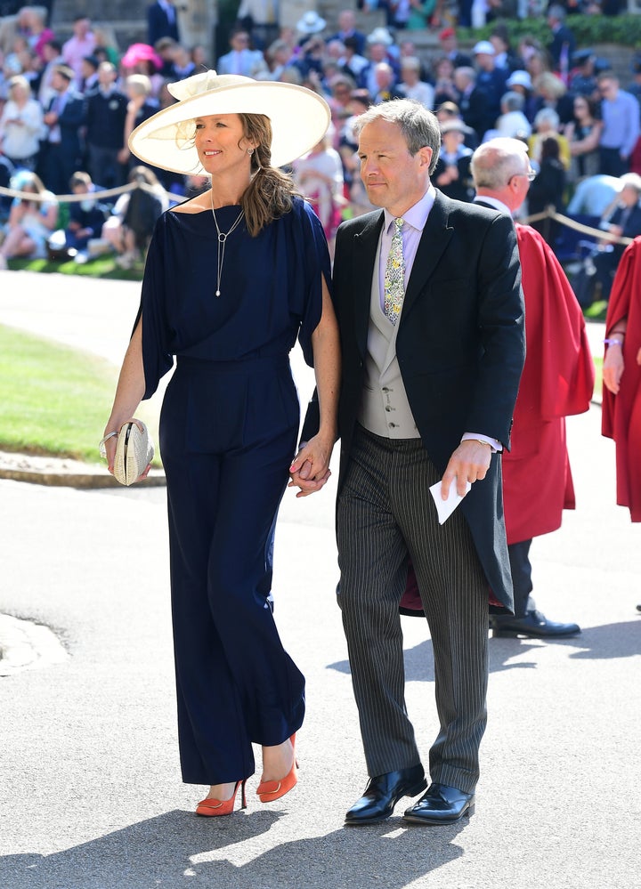 Tom and Claudia Bradby arrive at St George's Chapel at Windsor Castle before the wedding of Prince Harry to Meghan Markle on May 19, 2018, in Windsor, England.