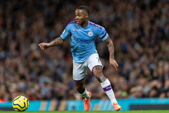 One of the men made a racist comment towards Manchester City winger Raheem Sterling 