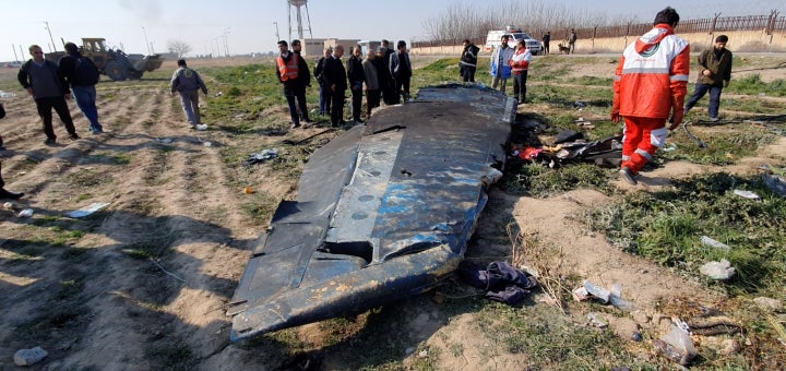 General view of the debris of the Ukraine International Airlines, flight PS752, that crashed on the outskirts of Tehran on Jan. 8, 2020 is seen in this screen grab obtained from a social media video.