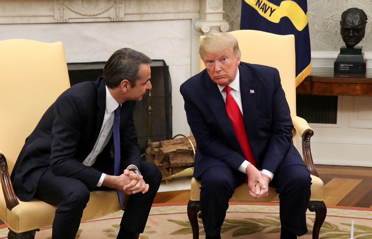 U.S. President Donald Trump listens to Greek Prime Minister Kyriakos Mitsotakis in the Oval Office of the White House in Washington, U.S., January 7, 2020. REUTERS/Jonathan Ernst