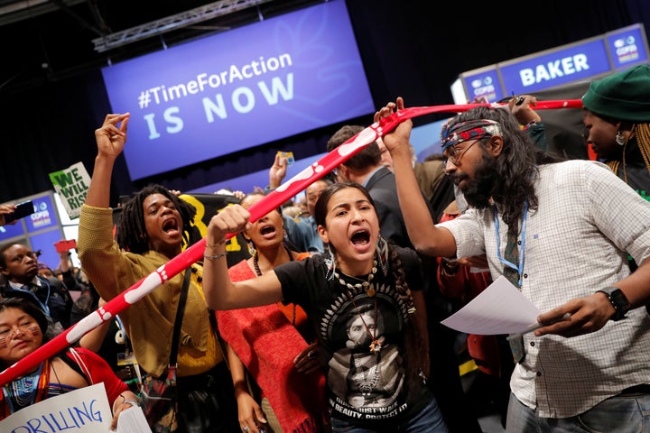 Climate activists protest outside the plenary room during COP25.