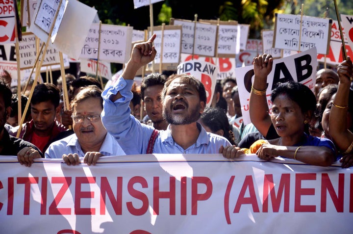Krishak Mukti Sangram Samiti (KMSS) Advisor Akhil Gogoi along with KMSS activist raise slogans during a protest against the Citizenship Amendment Bill (2016) in Guwahati, Assam, Nov. 22, 2019.