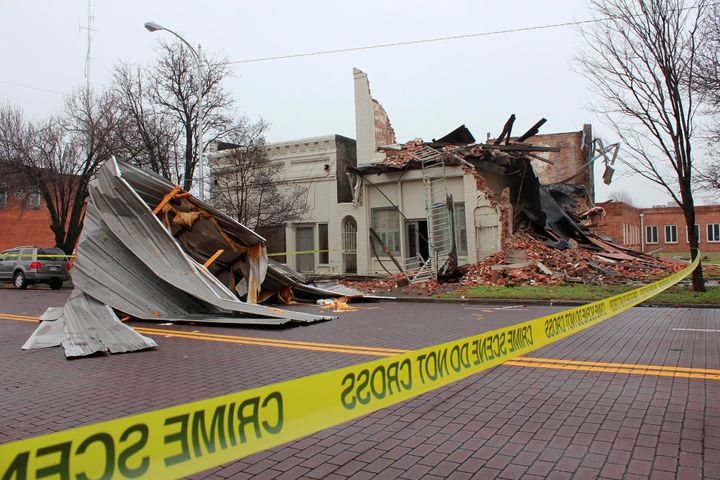 Severe storms sweeping across parts of the U.S. South were blamed for deaths and destruction, such as this unoccupied business on Main Street in downtown Greenville, Miss., Saturday, Jan. 11, 2020. The storms are blamed for the deaths of at least nine people, as high winds, tornadoes and unrelenting rain battered a large area of the South. (Catherine Kirk/The Delta Democrat-Times via AP)