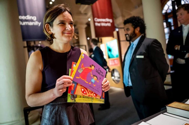 Esther Duflo with the books