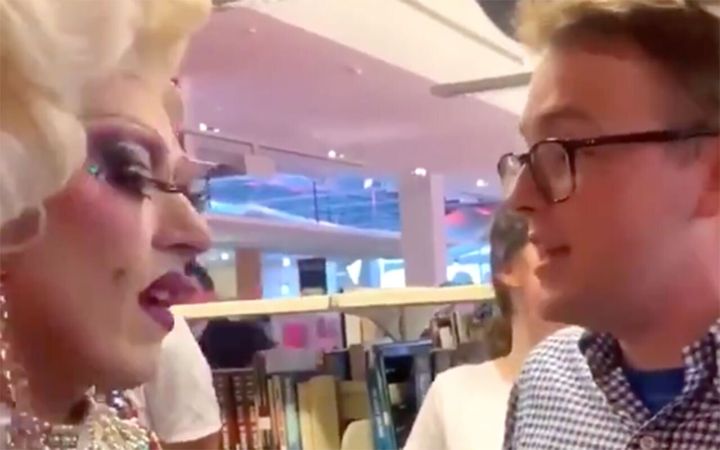 A member of the University of Queensland's Young Libs chants "drag queens are not for kids" at a public book story time event in Brisbane. 