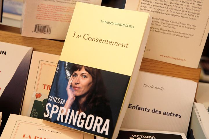 This photo taken Thursday, Jan. 2, 2020 shows the book "Le Consentement" (Consent) by Vanessa Springora and displayed in a Boulogne Billancourt bookstore, outside Paris. The literary editor alleges that she had a destructive underage sexual relationship with feted French author Gabriel Matzneff, now in his eighties. (AP Photo/Christophe Ena)