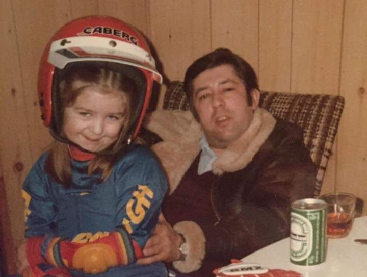 Nicola as a child alongside her father