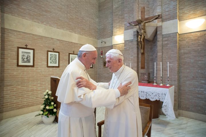 In this photo taken on June 28, 2017, Pope Francis embraces Emeritus Pope Benedict XVI, at the Vatican. 