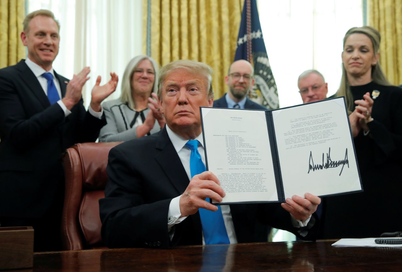President Donald Trump displays the "Space Policy Directive 4" establishing a Space Force as the sixth branch of the armed forces, Feb. 19, 2019. 