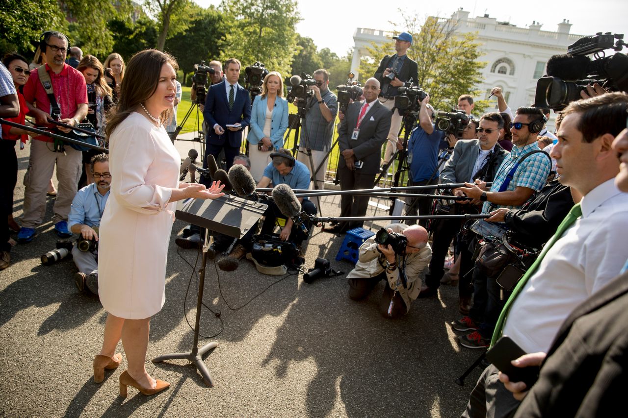 White House press secretary Sarah Huckabee Sanders speaks to reporters on the North Lawn outside the White House on May 23, 2019.