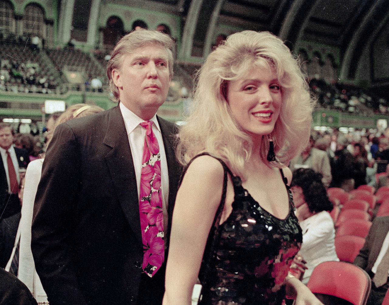Real estate magnate Donald Trump and his then-girlfriend (and eventual second wife) Marla Maples are seen at the Holyfield-Foreman fight at Trump Plaza in Atlantic City, N.J., April 19, 1991. 