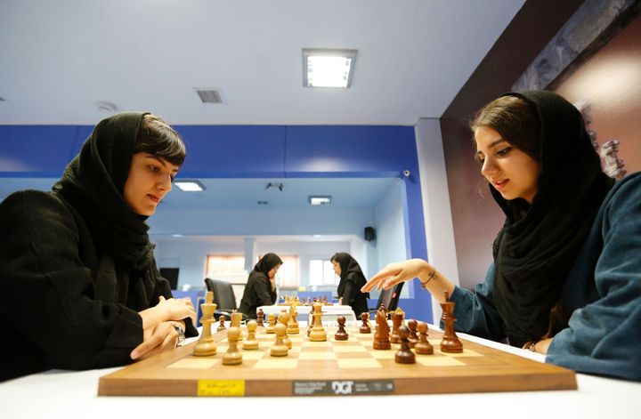 Iranian chess players Mitra Hejazipour and Sara Khademalsharieh.