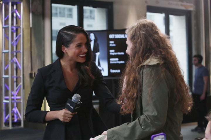 Meghan Markle meets Emily, a fan who she connected with on Twitter, at AOL Build in 2016.