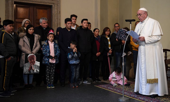 Pope Francis delivers a speech at the Vatican on Dec. 19, 2019, during an audience with refugees who'd arrived from the Greek island of Lesbos.