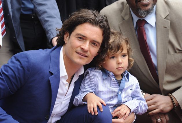 Ο Ορλάντο Μπλουμ με τον γιο του Φλιν, το 2014.