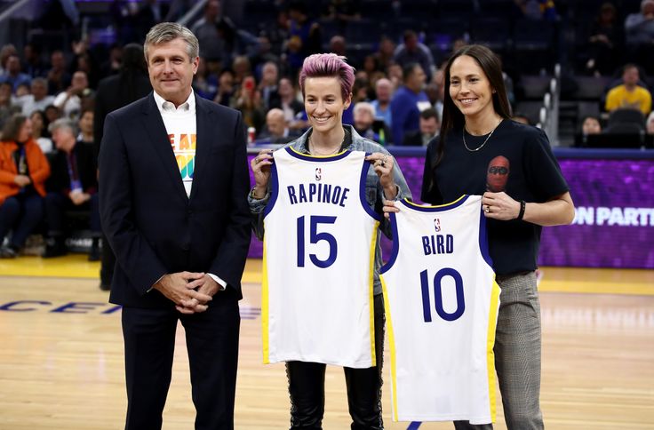In October, Welts (left) presented U.S. women’s national soccer team captain Megan Rapinoe and WNBA star Sue Bird with Golden State Warriors' jerseys.