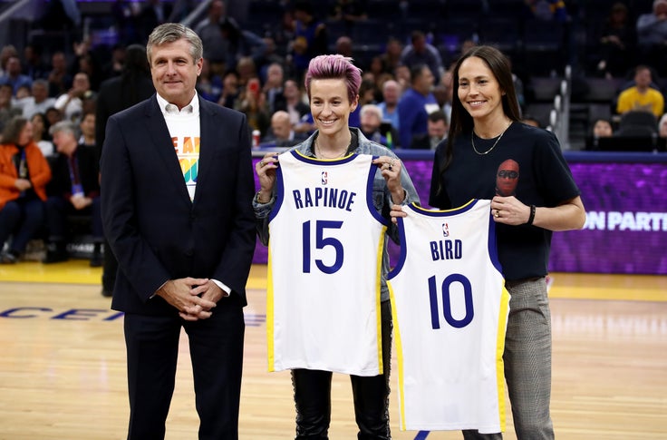 In October, Welts (left) presented U.S. women’s national soccer team captain Megan Rapinoe and WNBA star Sue Bird with Golden State Warriors' jerseys.