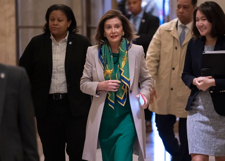 Speaker of the House Nancy Pelosi, D-Calif., arrives to meet with the Democratic Caucus at the Capitol in Washington on Tuesday.