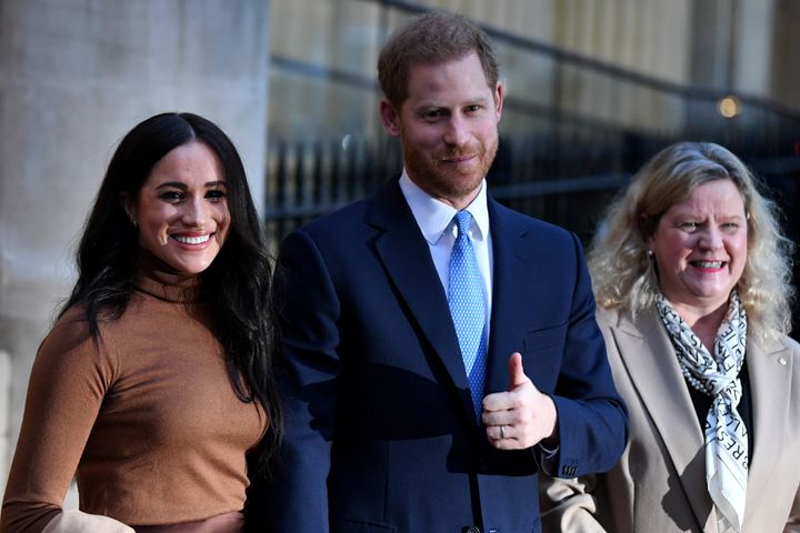 The Duke and Duchess of Sussex stand with High Commissioner for Canada in the United Kingdom Janice Charette as they leave after their visit to Canada House in London on Jan. 7, 2020. 