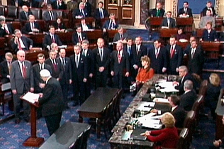 In January 1999, then-House Judiciary Committee Chairman Rep. Henry Hyde, R-Ill., reads the articles of impeachment against P