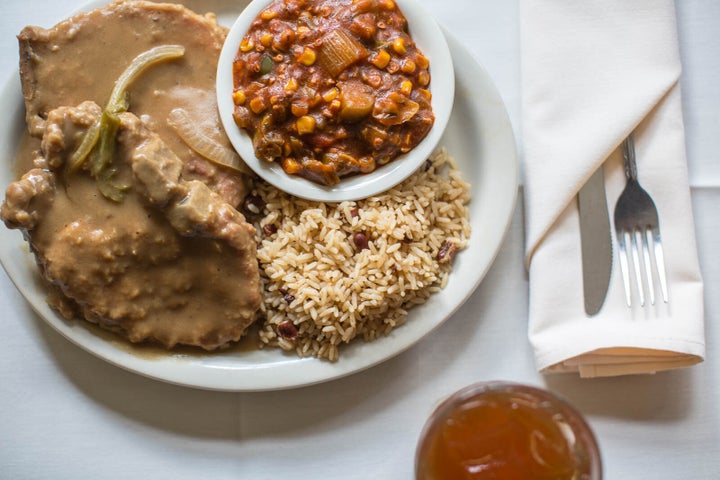 Sylvia's smothered pork chops with okra and tomato gumbo.