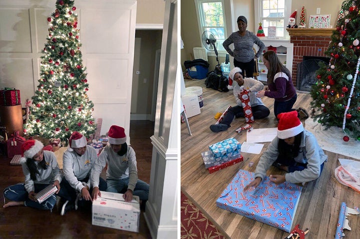 Chapman helping with a holiday toy drop-off volunteer event at Genesis Joy House in December 2019.