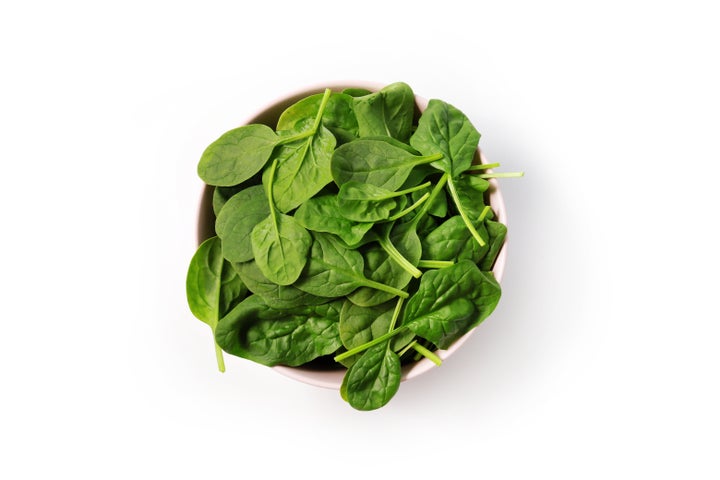 Foods considered yin include dark leafy greens like spinach.