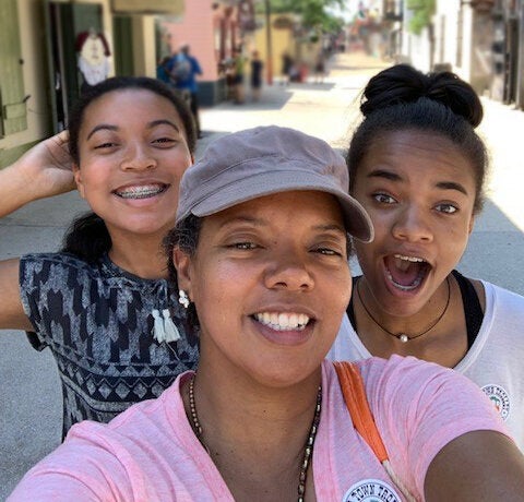 Chapman with daughters Makayla (left) and Ashley (right) on vacation in Orlando, Florida in February 2019.