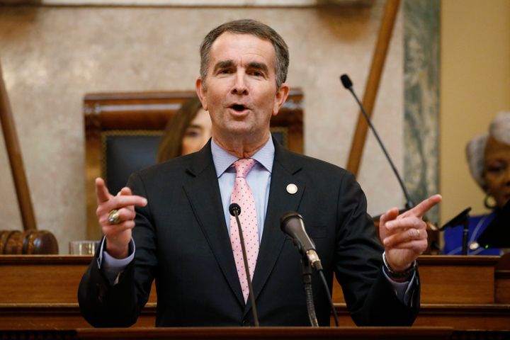 Virginia Gov. Ralph Northam gestures as he delivers his State of the Commonwealth address before a joint session of the Assembly at the state Capitol in Richmond, Va., Wednesday, Jan. 8, 2020. (AP Photo/Steve Helber)