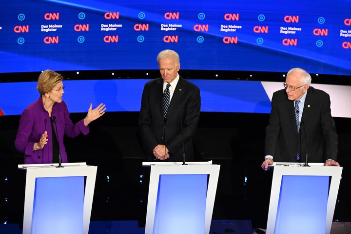 Sen. Elizabeth Warren, former Vice President Joe Biden, and Sen. Bernie Sanders participate in the seventh Democratic primary debate of the 2020 presidential campaign season at the Drake University campus in Des Moines, Iowa. 