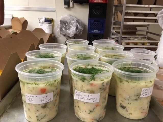 These bowls of soup are labeled with loving messages and were made by a group organized by Eat for Equity.