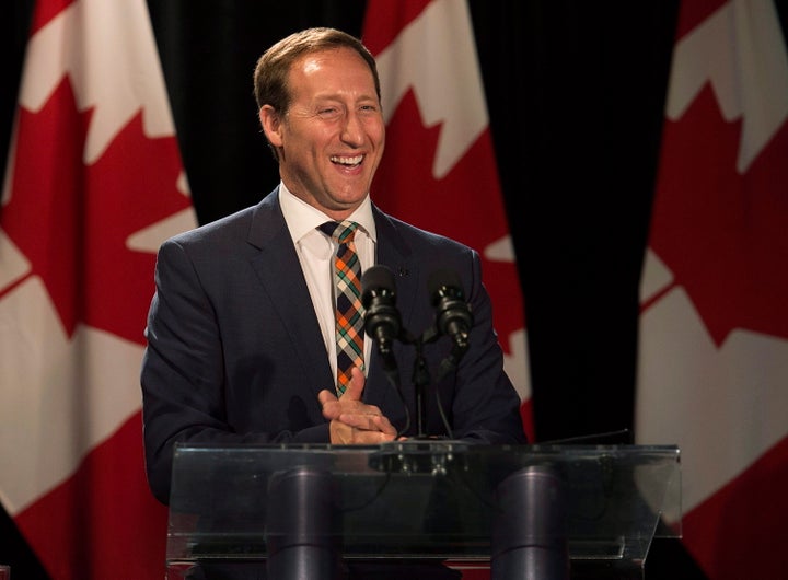 Peter MacKay sports a smile after announcing his resignation in Stellarton, N.S., on May 29, 2015.