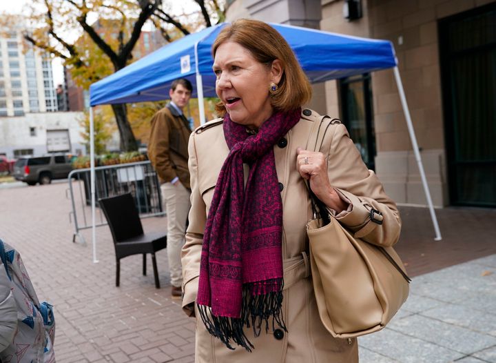 Rep.-elect Ann Kirkpatrick, D-Ariz., walks outside after checking-in for orientation for new members of Congress, Tuesday, Nov. 13, 2018, in Washington. (AP Photo/Pablo Martinez Monsivais)