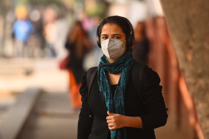 A girl wearing a face mask due to poor air quality in Delhi on November 25, 2019.