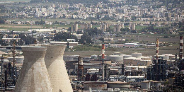 A general view shows an oil refinery, in Israel's third city of Haifa on April 20, 2015, after the city's Mayor Yona Yahav ordered municipal rubbish trucks to block access to four chemical plants and a refinery after warnings linking high cancer rates in the area to air pollution. The standoff began after a senior health ministry official said last week that 16 percent of cancer cases in the Haifa Bay area could be attributed to air pollution. AFP PHOTO / JACK GUEZ (Photo credit should read JACK GUEZ/AFP/Getty Images)