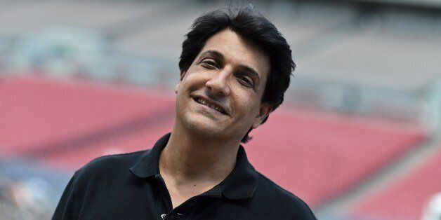 Choreographer Shiamak Davar smiles for the media during a rehearsal at the Raymond James Stadium on the fourth and final day of the 15th International Indian Film Academy (IIFA) Awards in Tampa, Florida, April 26, 2014. AFP PHOTO JEWEL SAMAD (Photo credit should read JEWEL SAMAD/AFP/Getty Images)