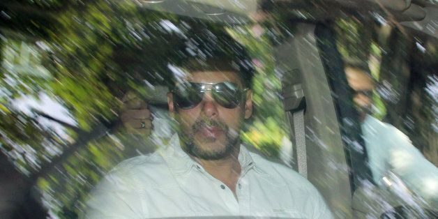 Bollywood actor Salman Khan arrives at a court in Mumbai, India, Wednesday, May 6, 2015. Media reports say a Mumbai court has held Khan guilty of running over five men sleeping on a sidewalk, killing one in a 2002 hit-and-run case. The court on Wednesday charged Khan with culpable homicide, saying all charges against him had been proved, Press Trust of India said. (AP Photo)