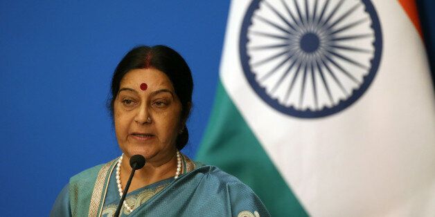 BEIJING, CHINA - FEBRUARY 2: Indian Foreign Minister Sushma Swaraj attends the press conference after the 13th trilateral meeting of Foreign Ministers from Russia, India and China (RIC) at Diaoyutai State guesthouse on February 2, 2015 in Beijing, China. The Russian and Indian Foreign Ministers are in China for meetings with the Chinese leaders and to attend the 13th RIC trilateral meeting. (Photo by Wu Hong-Pool/Getty Images)
