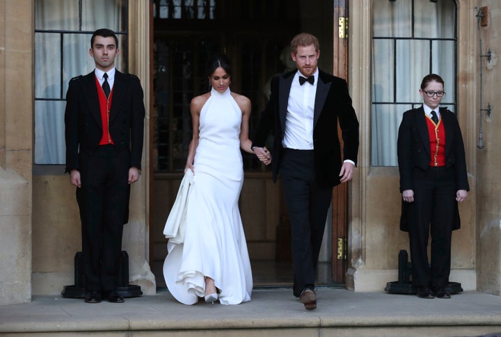 Meghan and Harry step out at their wedding reception.