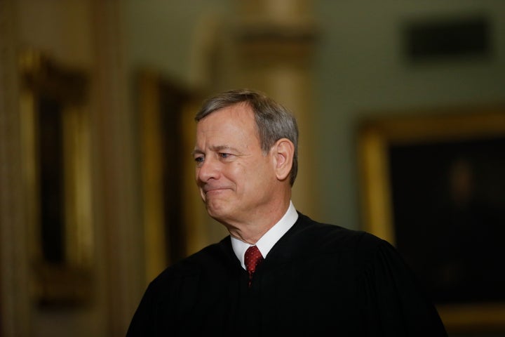 Supreme Court Chief Justice John Roberts walks to the Senate chamber at the Capitol on Thursday.