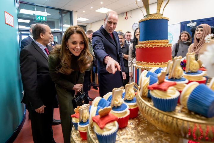 The Duke and Duchess of Cambridge inspect cakes as they visit the Khidmat Centre on Jan. 15 in Bradford. 