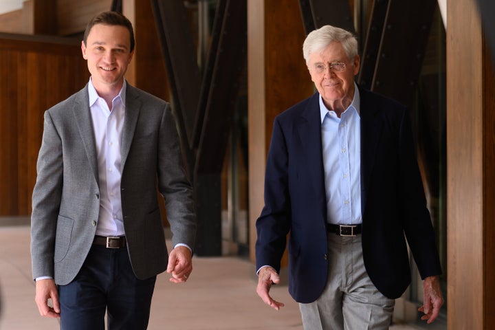 Brian Hooks (left), now CEO and chairman of the Koch network Stand Together, and Charles Koch attend an organizational gathering in Colorado Springs, Colorado, on June 29, 2019.