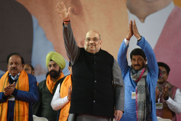 Home Minister Amit Shah and Delhi BJP president Manoj Tiwari after addressing a rally at Indira Gandhi Indoor Stadium, on January 5, 2020 in New Delhi.