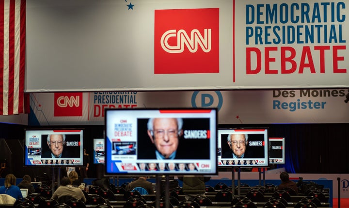 After a 15-year legal fight, CNN settled a dispute with former employees just before the latest Democratic debate.