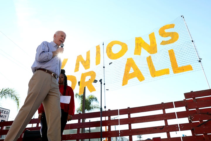 Former Vice President Joe Biden speaks to McDonald's cooks and cashiers on a picket line in December.