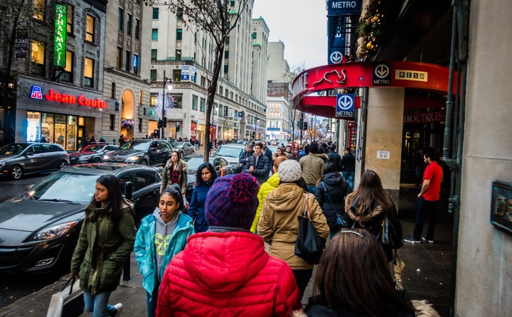 Pedestrians on the Ste-Catherine shopping strip in Montreal, Que., Nov. 25, 2017. Canada's rebound from an economic slump at the end of last year likely means no interest rate cuts this year for borrowers.