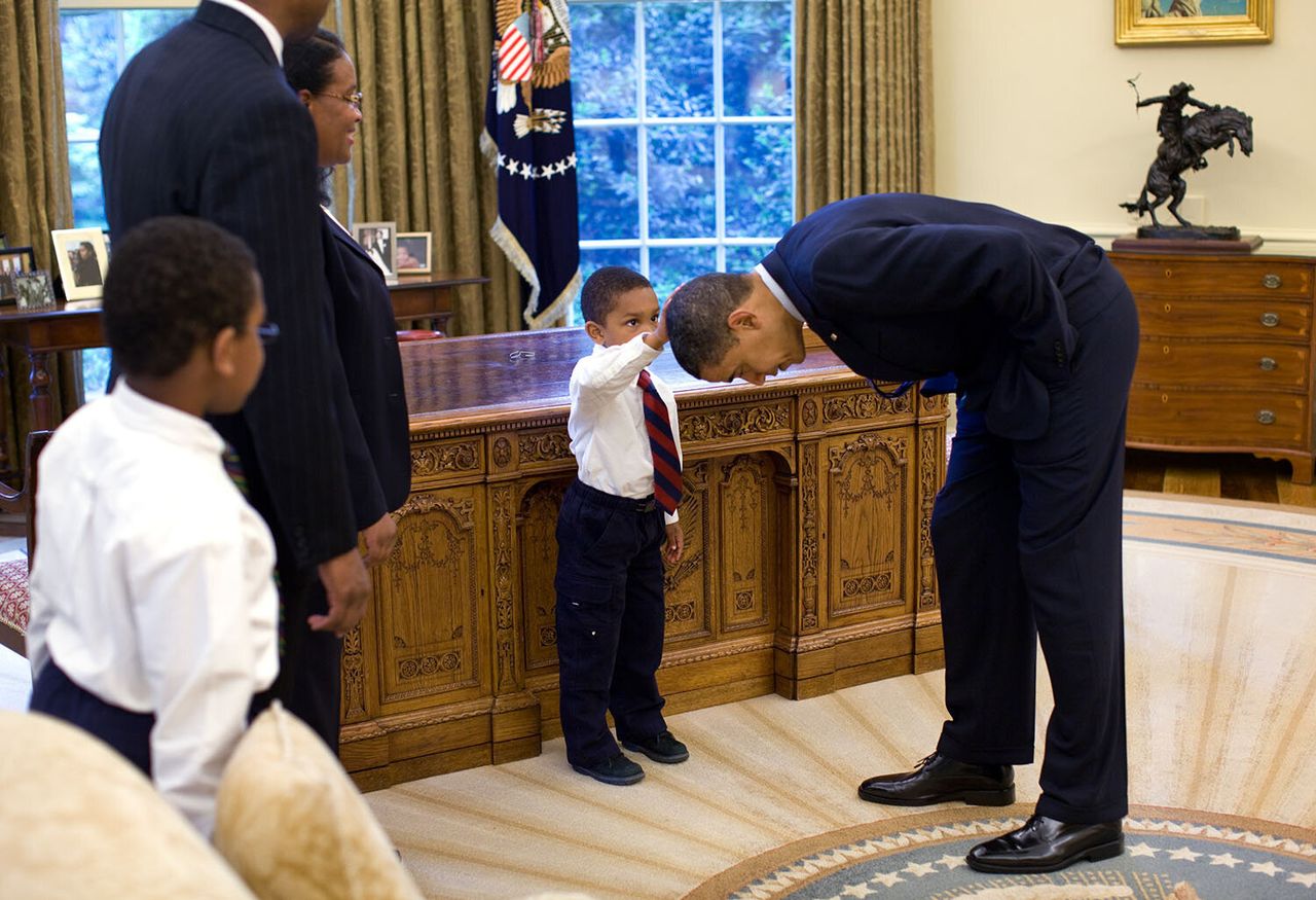 When a 5-year-old visiting the Oval Office in 2009 asked if he could touch President Barack Obama's hair to see if it felt the same as his, the result was one of the seminal photographs of Obama's White House tenure.