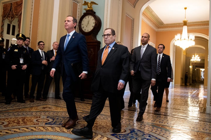 Impeachment managers arrive at the Senate to read the articles of impeachment on Thursday, led by Reps. Adam Schiff (D-Calif.), left, and Jerrold Nadler (D-N.Y.).