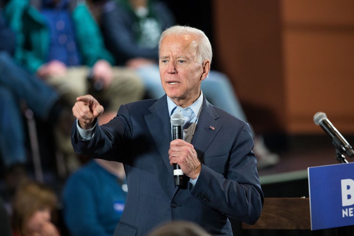 Former Vice President Joe Biden takes questions at a Dec. 30 campaign town hall in Derry, New Hampshire. Biden favors a public option for health coverage.